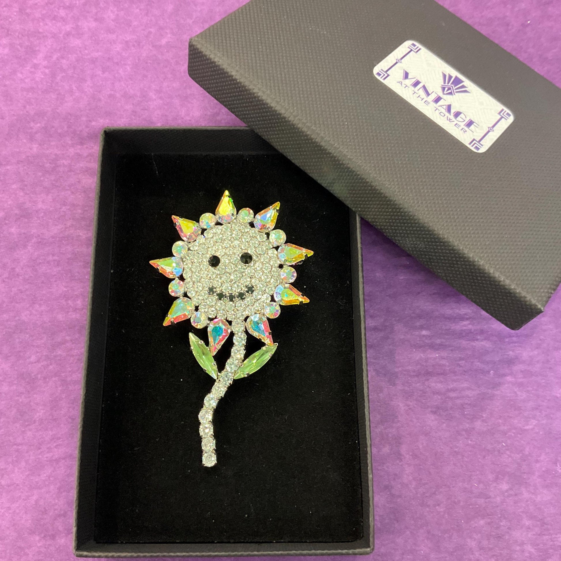Vintage Butler and Wilson Large Crystal Smiley Sunflower Brooch, Silver tone with silver , Aurora Borealis and Black Rhinestones