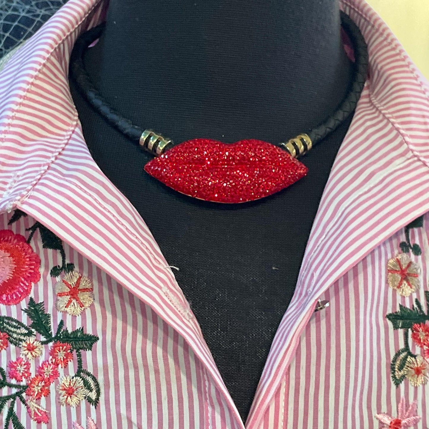 Vintage Butler and Wilson Crystal Lips Leather Necklace, gold tone with red rhinestones and black braided leather