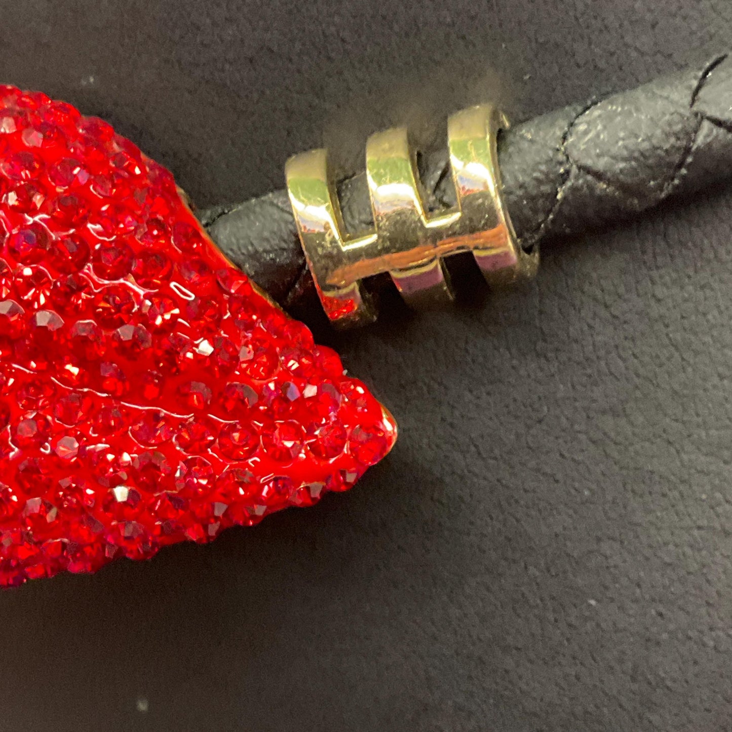 Vintage Butler and Wilson Crystal Lips Leather Necklace, gold tone with red rhinestones and black braided leather