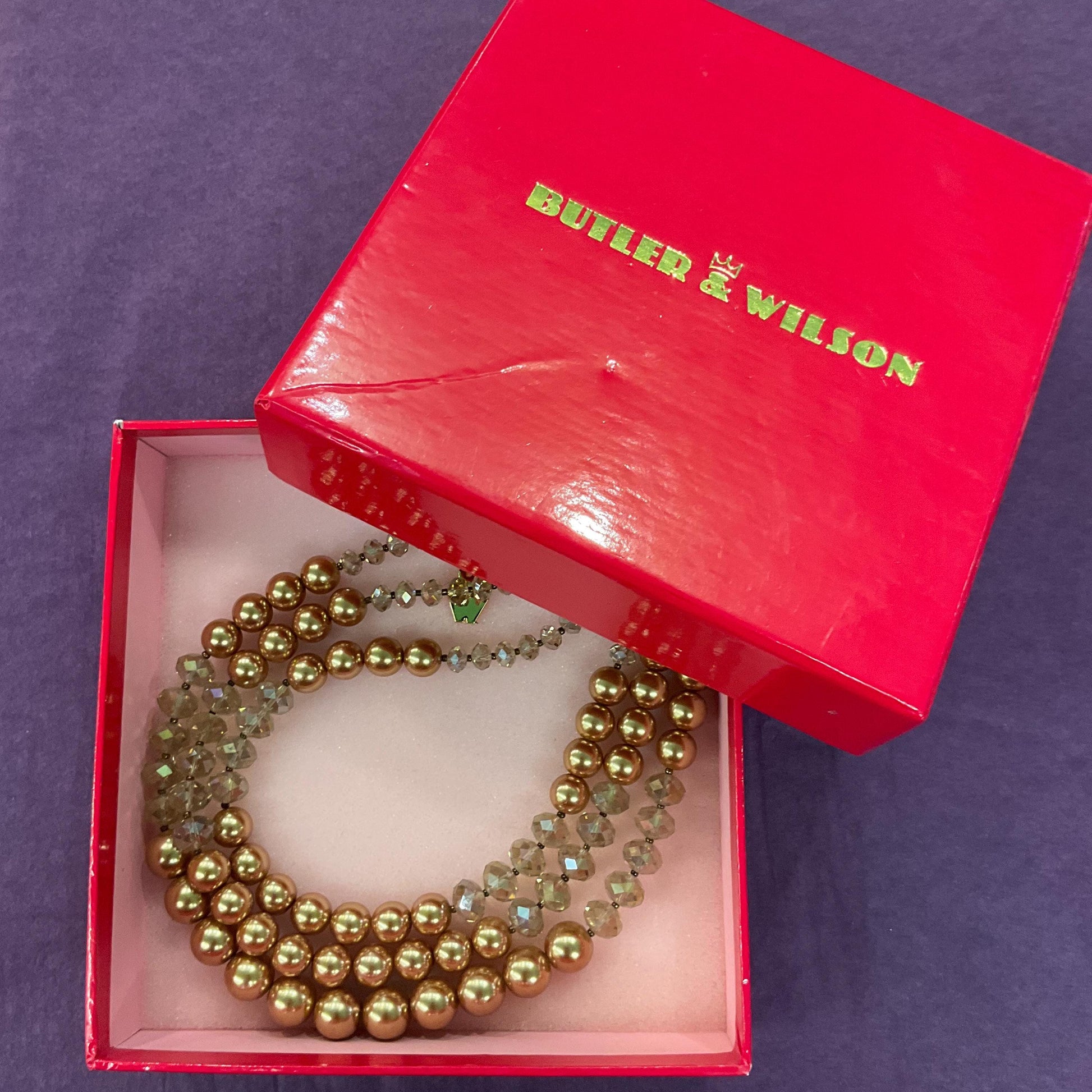 Vintage Butler and Wilson Gold Tone Borealis Crystal and Faux Pearl Triple Strand Statement Necklace